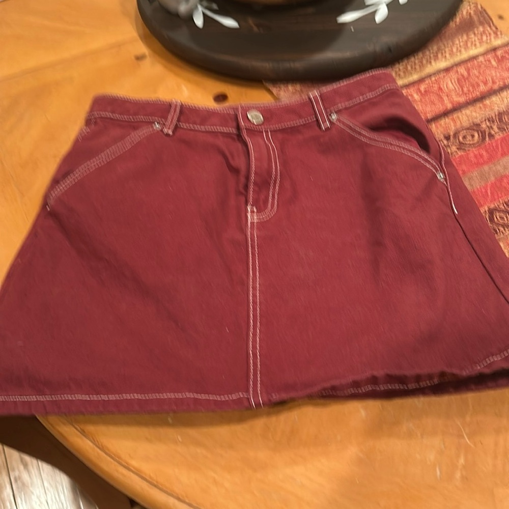 Burgundy denim mini skirt by Divided. Perfect condition!